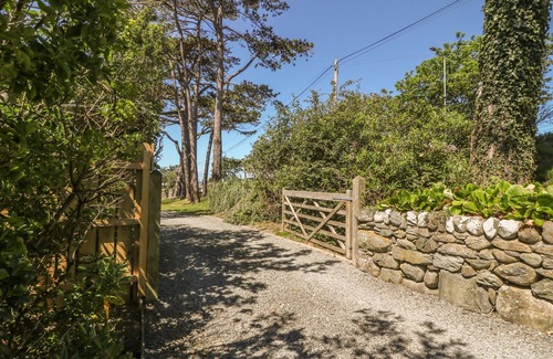 Talybont Cottage | Discover Tyddyn Goronwy: Oceanfront Bliss with Pool Access