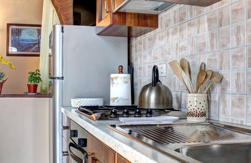 Ponte Agli Stolli Apartment | Rustic Apartment in Tuscany with Breakfast & Family Amenities