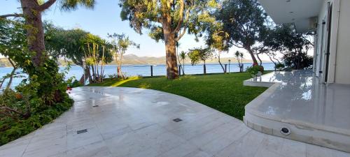 Lygia Apartment | Oceanfront Tzeni Villa - Rated 9.1/10 Family Getaway