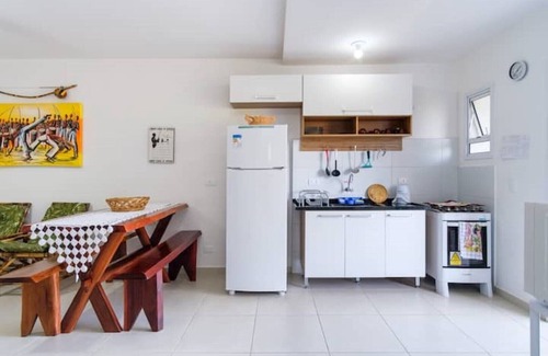 Pereque-Acu Apartment | Ubatuba - Relax by the Pool, Steps from a Beautiful Beach
