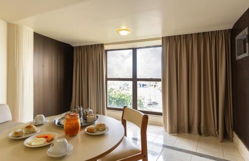 Uberaba Apartment | Discover Comfort at Uberaba Apart Hotel with Pool & Dining