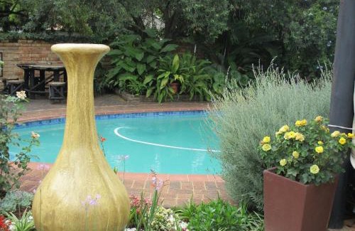 Klerksdorp House | Ukarimu Guest House: 4-Star Comfort with Pool & Restaurant