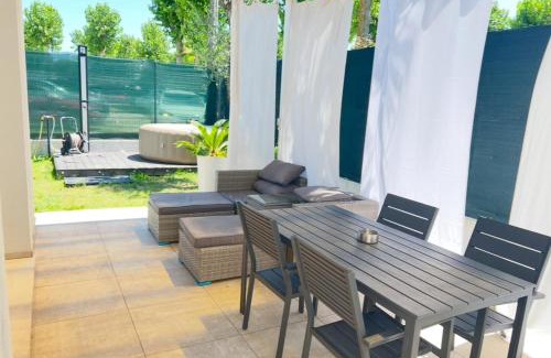 Lido di Jesolo Apartment | Elegant Ulisse Palace: Oceanfront Pool & Hot Tub Retreat
