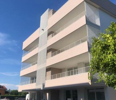 Lido di Jesolo Apartment | Elegant Ulisse Palace: Oceanfront Pool & Hot Tub Retreat