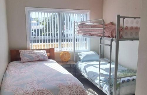 Papamoa Beach House | Ideal Family Getaway - Pet Friendly with Ocean Views!