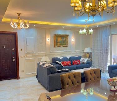 Cairo Apartment | Luxury 3BR Retreat with Pools, Dining & Ocean Views