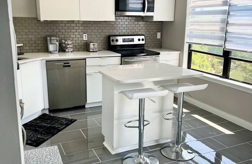 West End Condo | Ultra modern stylish LOFT close to everything! Parking, balcony, fireplace, Wifi