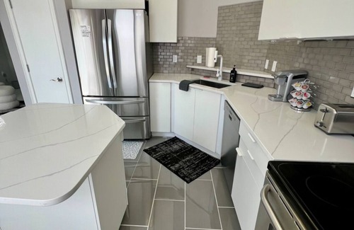 West End Condo | Ultra modern stylish LOFT close to everything! Parking, balcony, fireplace, Wifi