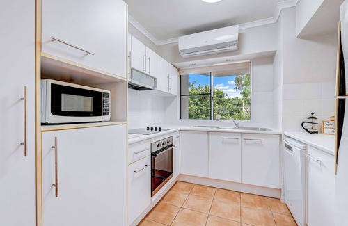 Wongaling Beach Apartment | Beachfront Escape at Ulysses One with Private Pool & Kitchen