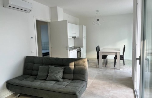 Lido di Jesolo Apartment | Experience Ulysses Palace: Family-Friendly with Pool Access