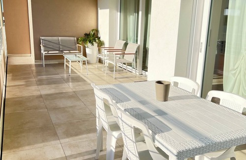 Lido di Jesolo Apartment | Experience Ulysses Palace: Family-Friendly with Pool Access