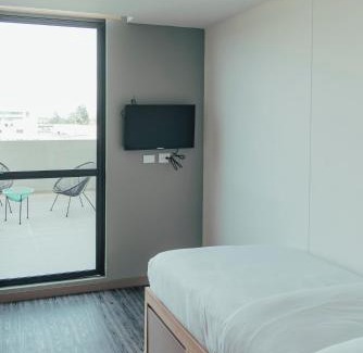 Chia Hotel | UMA Suites Chia: Oceanfront Escape with Hot Tub & Pool