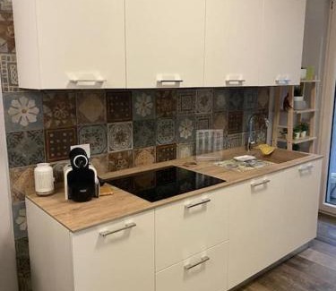 San Donato Milanese Apartment | Relaxing Oasis Steps from Policlinico with Family-Friendly Perks