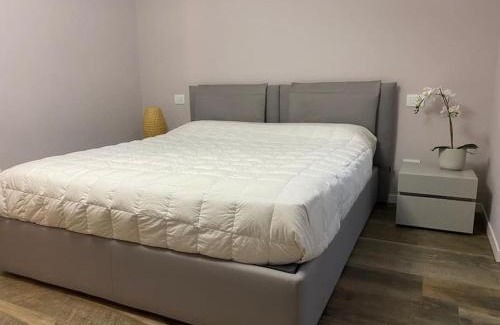 San Donato Milanese Apartment | Relaxing Oasis Steps from Policlinico with Family-Friendly Perks