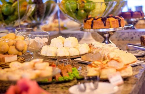 Santana Hotel | Unico Apart Hotel: Pet-Friendly Oasis with Ocean Views