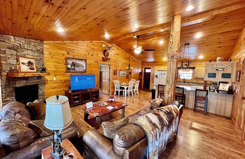 Spencer Cabin | Cozy 3-Bed Cabin with Fireplace and Waterfall Oasis