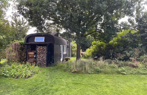 Smidstrup Strand Cottage | Quirky Circus Wagon: Oceanfront Oasis Near the Beach