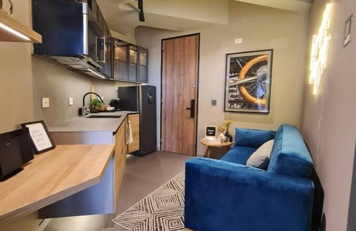 Calle 100 Apartment | Stylish Loft with Balcony, Pool & Spa Access Await You