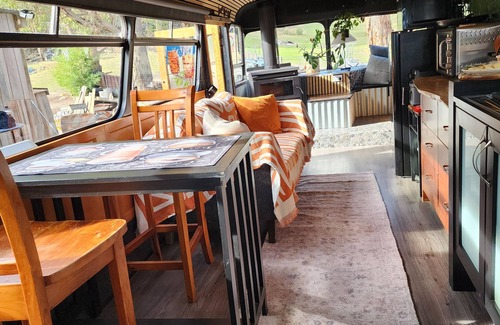 Southern Apartment | Unique, Exciting Bus Located on 63 acres with a Cosy woodheater. Luxury.