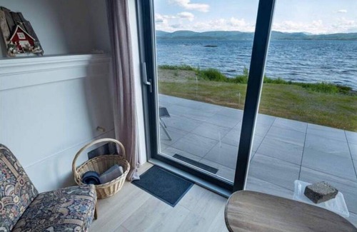 Tverlandet House | Seaside Retreat with Ocean View and Spa Amenities