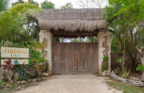 Soliman Bay Cabin | Cozy Ecolush Lodge: Mayan Dome Room with Bikes & Kids' Fun