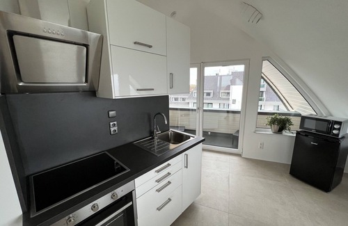Huisduinen Apartment | Sea View Loft Retreat with Pool & Breakfast - Loft Seaview