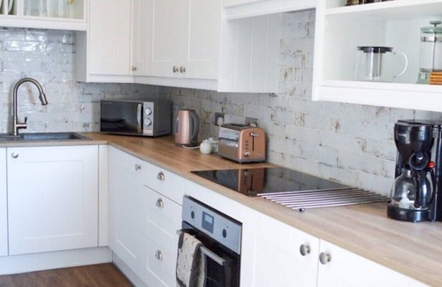 Edzell Apartment | Discover a Unique Bank Conversion in Vibrant Village Center