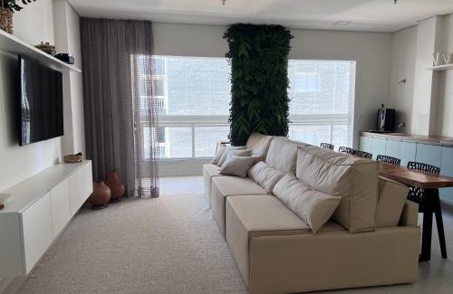 Boqueirao Apartment | Experience Unitá Praia Grande Boqueirão with Ocean Views