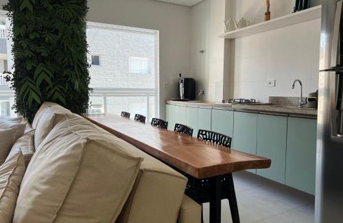 Boqueirao Apartment | Experience Unitá Praia Grande Boqueirão with Ocean Views