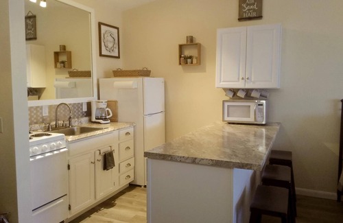 North Truro Condo | Deluxe Efficiency with Private Deck & Ocean Views - Rated 9.8