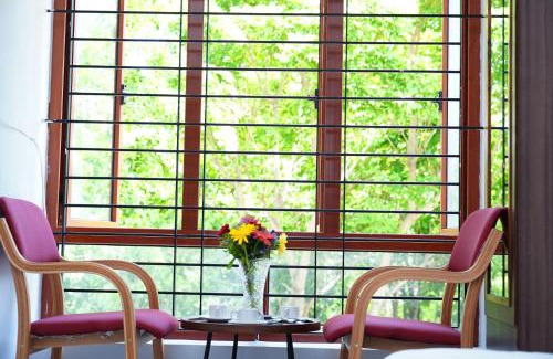 Kuvempu Nagara Apartment | Discover Unnathi Suites: Family & Pet Friendly Getaway