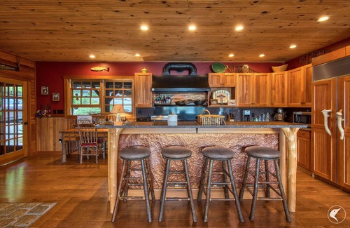 Saranac Lake Cabin | Explore the Kiwassa Lake Home with Pool and Family-Friendly Amenities