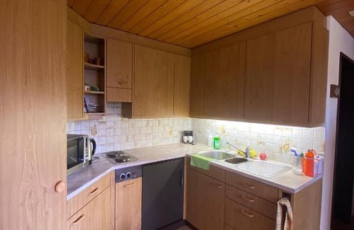 Merligen Apartment | Rooms with Scenic Lake Views for Family Getaways