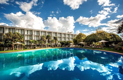 Maseru Apartment | Relax in Maseru: Garden Views & Inviting Pool Awaits!