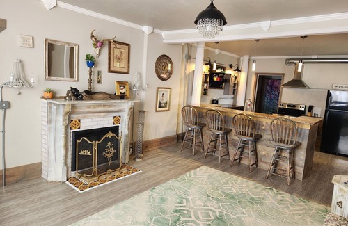 Lansing House | Relax at the Opal Suite of Lotus House - Rated 10/10!