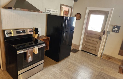 Lansing House | Relax at the Opal Suite of Lotus House - Rated 10/10!
