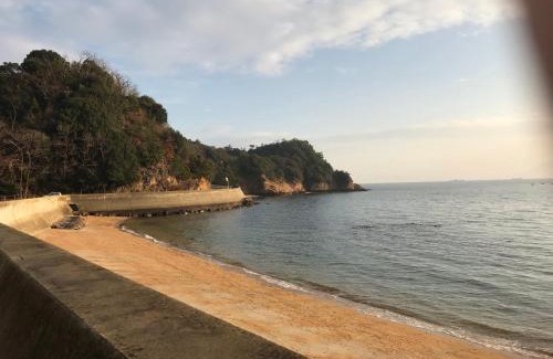 Miyanoura Apartment | Ocean View Escape at UOGASHI 7070 with Family-Friendly Amenities