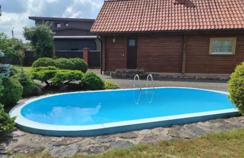 Anyksciai House | Delightful Upės Apartamentai with Terrace & Pool Access