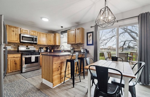 Lansing House | Comfortable Lansing Home with Basement Theater Room
