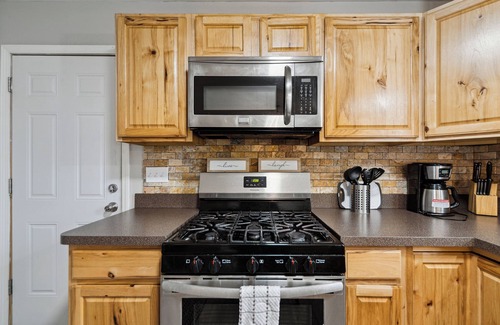 Lansing House | Comfortable Lansing Home with Basement Theater Room