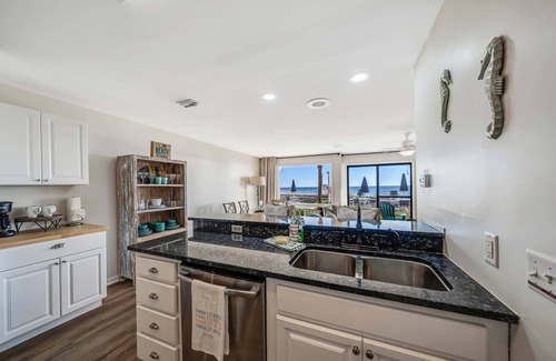 Fort Bay Condo | Beachfront Retreat on Quiet West End with Pool & Spa