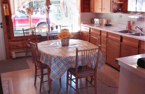 Petoskey Cabin | Pet-Friendly Log Cabin Retreat with Lake Views & Hot Tub