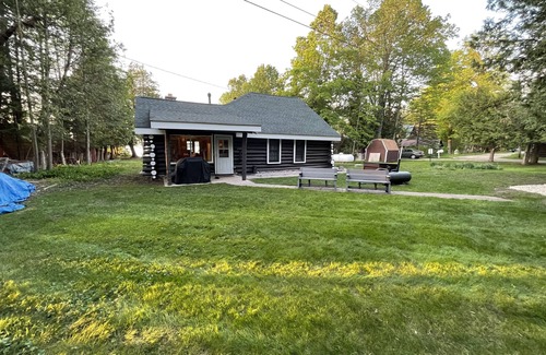 Petoskey Cabin | Pet-Friendly Log Cabin Retreat with Lake Views & Hot Tub