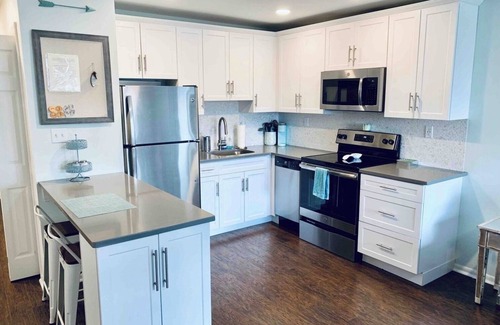 North End Condo | Top Rated Condo Steps from Boardwalk with Pool & Ocean Views