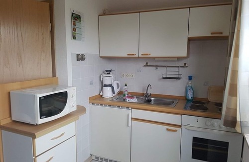 Westeraccum Apartment | Relaxing Upper Apartment in Westeraccum with Pool & Balcony