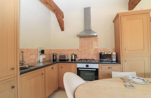 Coln St Aldwyns Cottage | Cozy Upper Mill Barn with Kitchen & Breakfast Included