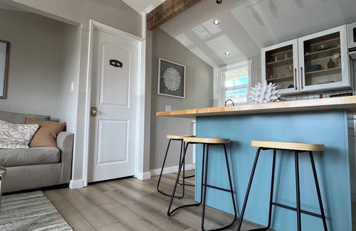 San Luis Obispo County Cottage | Upscale Beach Cottage - rock view - paddleboards
