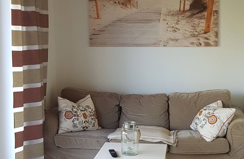 Blengow Apartment | Tranquil Retreat: Garden Terrace & Ocean View Awaits
