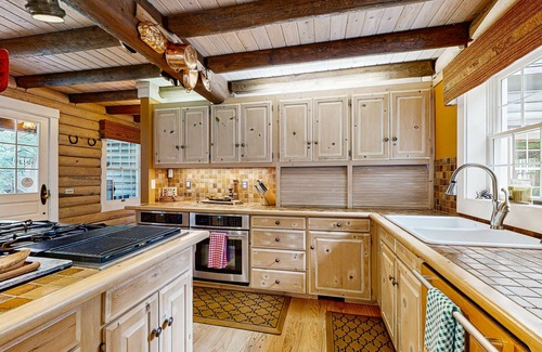 Trout Lake Cabin | Elegant Riverfront Lodge with Firepits & Game Room Near Mt. Adams