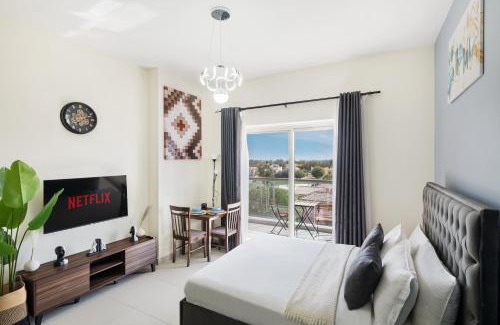 Dubai Sports City Apartment | Deluxe Studio in Eagleheights with Pool & Hot Tub Amenities